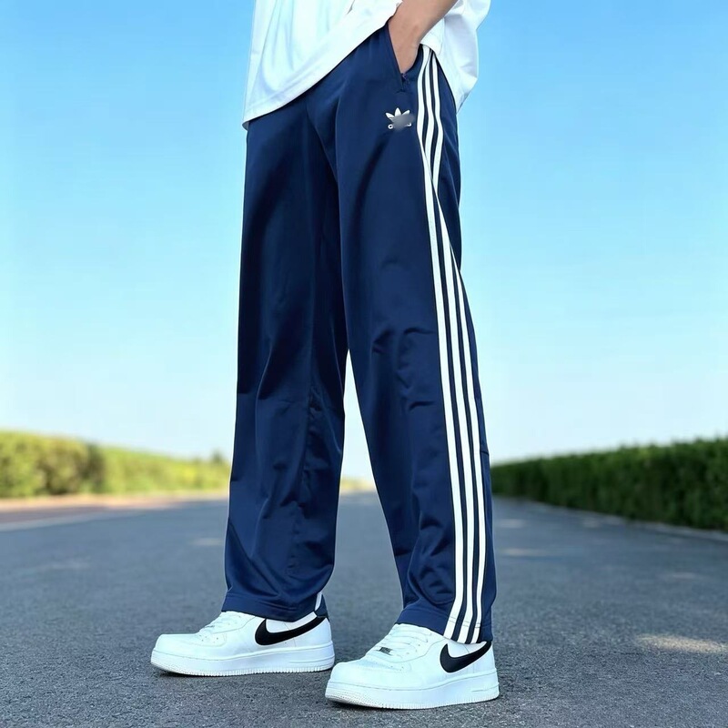 Cross-border spring and autumn three-stripe sports embroidered pants, unisex, clover logo, trendy brand, loose outdoor casual pants Cross-border spring and autumn three-stripe sports embroidered pants, unisex, clover logo, trendy brand, loose outdoor casual pants