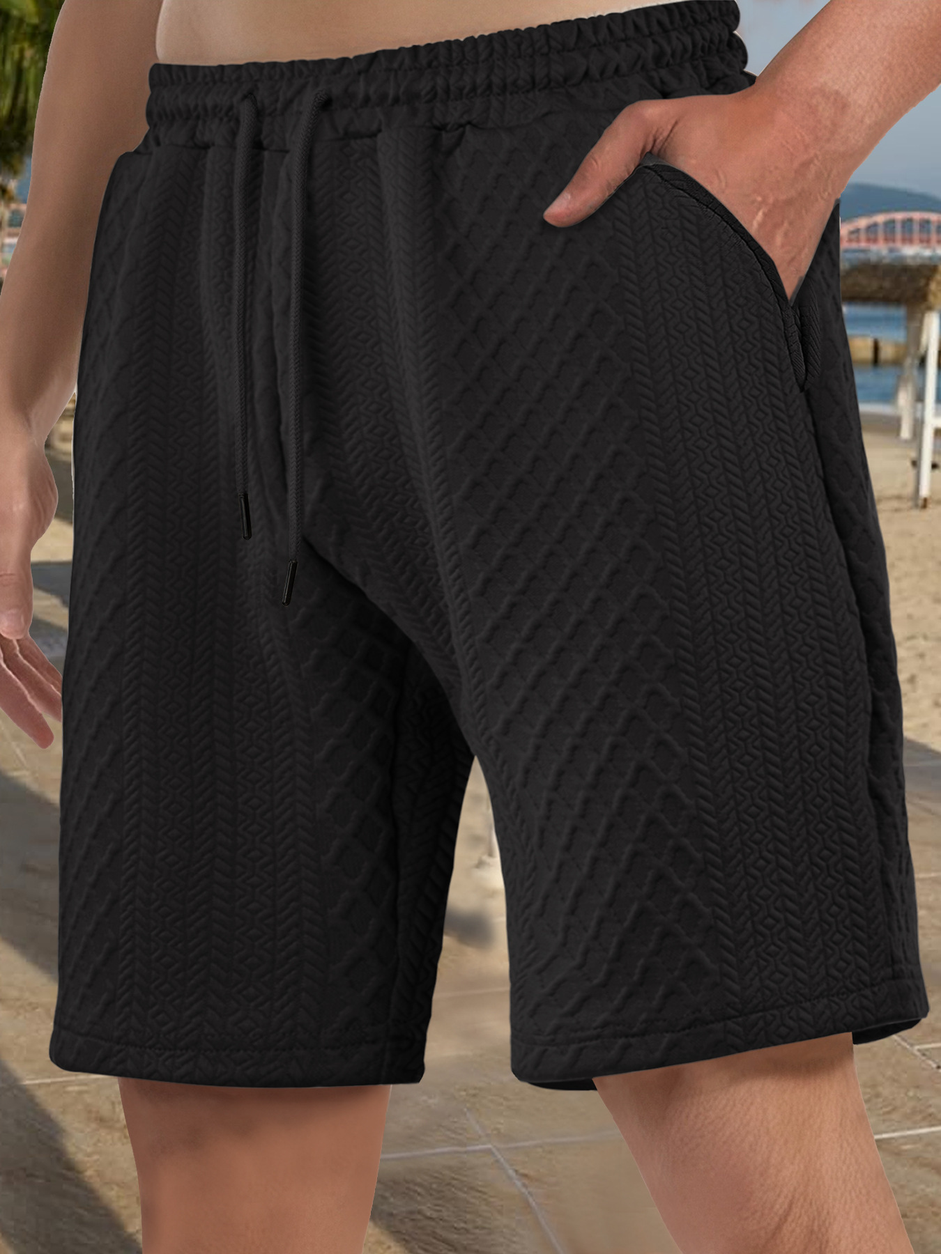Europa y Estados Unidos ropa de hombre transfronteriza spot verano suelta pantalones cortos de color sólido jacquard correa de hombre casual pantalones cortos de playa