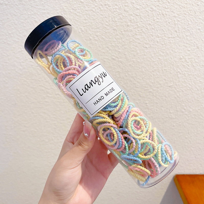 Bebés color caramelo de alta elasticidad pulgar anillo de cabello de niñas adornamiento de cabello de dopamina no daña banda de goma de cabello