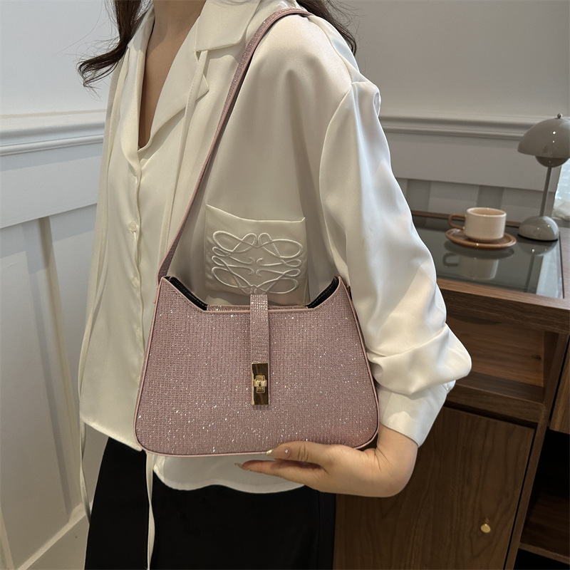 Bolso de nicho coreano para mujeres 2024 nueva cadena de textura de alta calidad universal de moda de hombro único bolso de silla de brazo