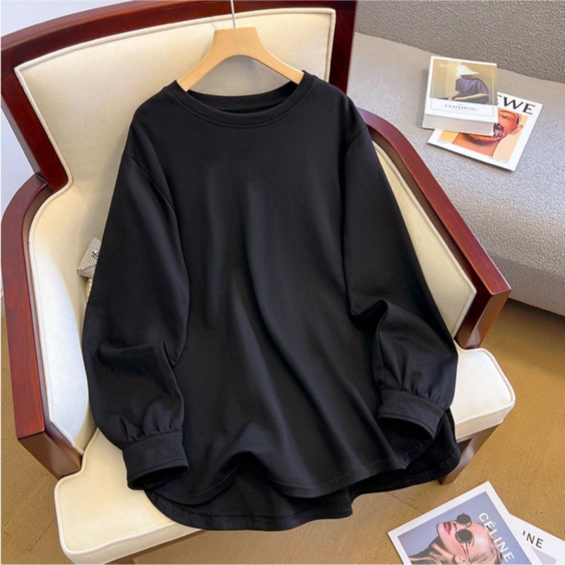 白い中長の長袖tシャツの女性は秋冬にヨーロッパの商品の中にガードルのシャツとサメのズボンの上着を着ます。