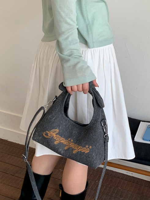 Bolso para mujeres 2026 nuevo estilo coreano bordado letras de brazalete bolso de tela alta textura denim mochila casual