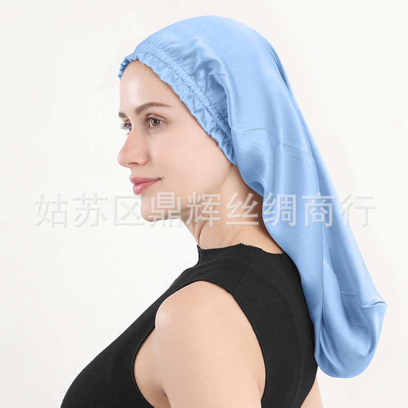 新商品のシルクの寝帽の桑のシルクの長髪の帽子の木の耳元の長い筒の帽子の女性の家庭のヘアケアの帽子のアマゾン