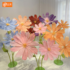 Large paper art flowers, handmade, for wedding props in the entertainment industry, used for store window displays, decorations, and on-site arrangements.
