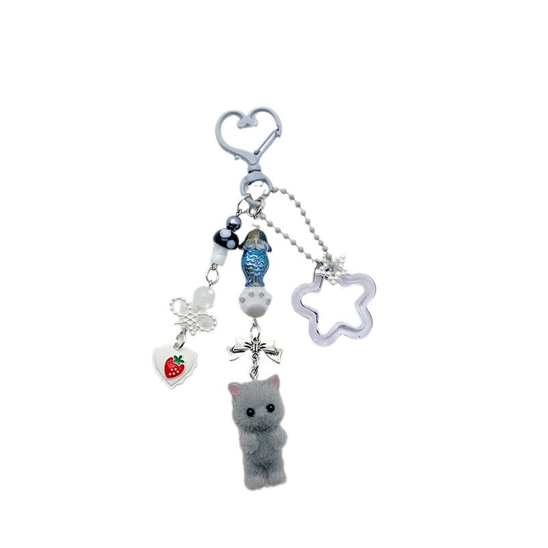Transfronterizo japonés y coreano ins lindo flocado gatito estrella de cinco puntas garra de gato amor llavero lote colgante de mochila de cadena Guben