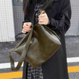 2025新款女士学生复古慵懒软皮大容量托特包帆布饺子包斜跨女包包