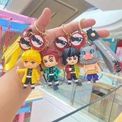 新商品の創意的なアニメの鬼滅の刃の鍵はアニメの自動車の鍵のペンダントの公仔のカップルの装飾の卸売りを掛けます。