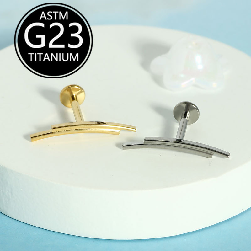 Silver pointed spike labret stud material detail