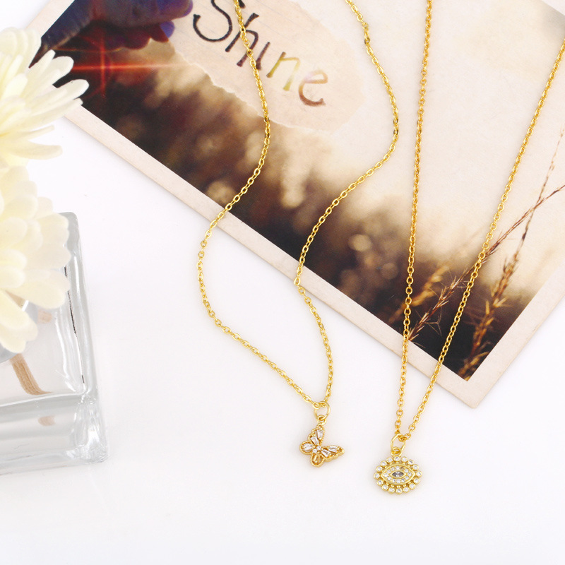 Hip hop butterfly eyes copper zircon necklace