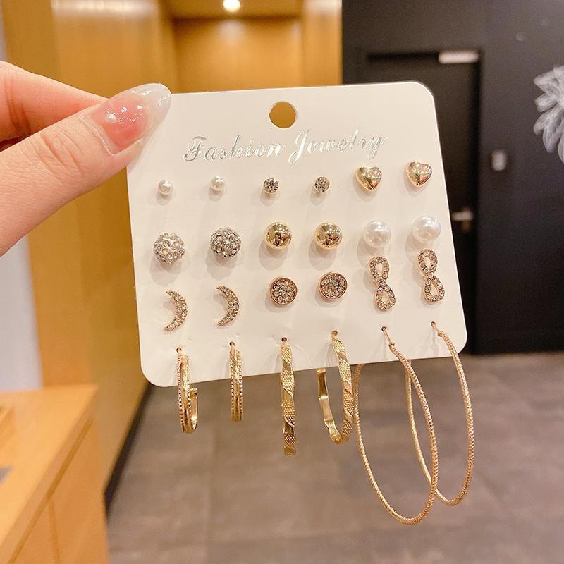 Pendientes de aro lisos para mujer, lujo ligero, pendientes de alta gama, pendientes populares, aretes de diseño exclusivo, aretes de otoño e invierno al por mayor