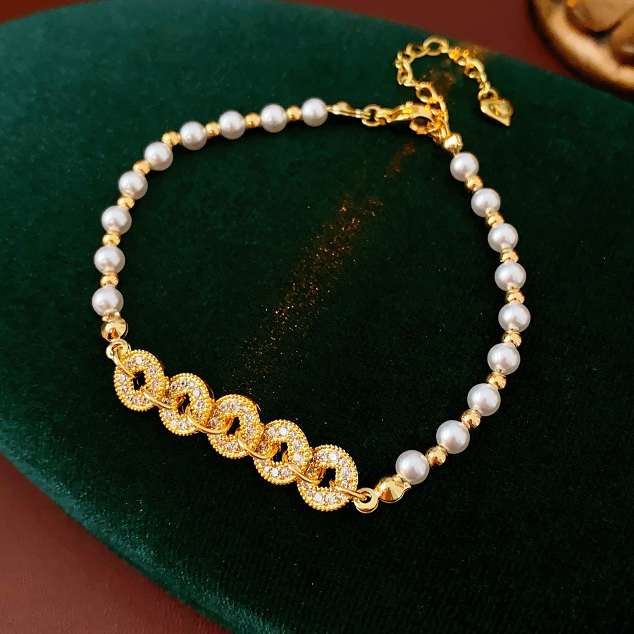 Zircon moneda de cobre, perlas, pulsera con cuentas, nuevo estilo chino, todo fósforo, pulsera retro, lujo ligero, sentido de alta gama, joyería de moda nacional al por mayor