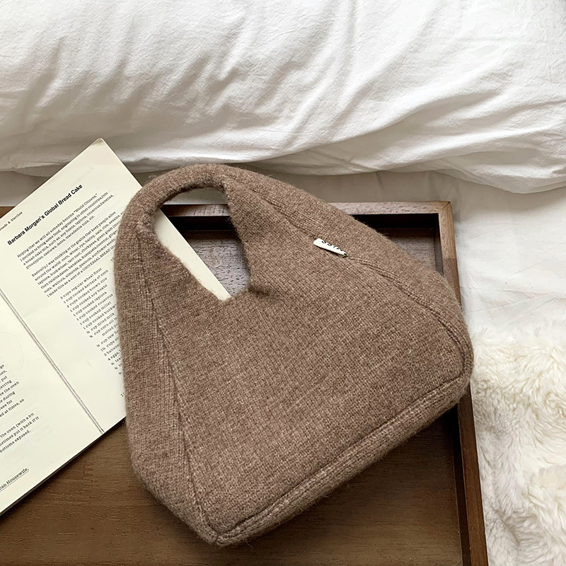 Bolso de hombro 2025 nuevo otoño e invierno nuevo estilo coreano simple y versátil bolso de muñeca de punto de gran capacidad bolso