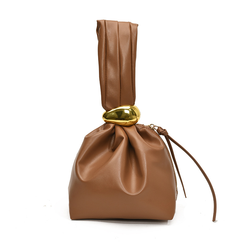 Bolsa de cubo simple y casual, 2025 primavera nueva moda coreana bolso de mano de alta belleza bolsa de mujer decoración