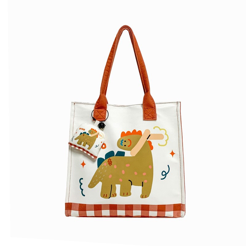 Caricatura de niños y niñas, bolsos de hombro de gran capacidad, bolsos de nicho de diseño, bolsos de mano nuevos lindos para niñas