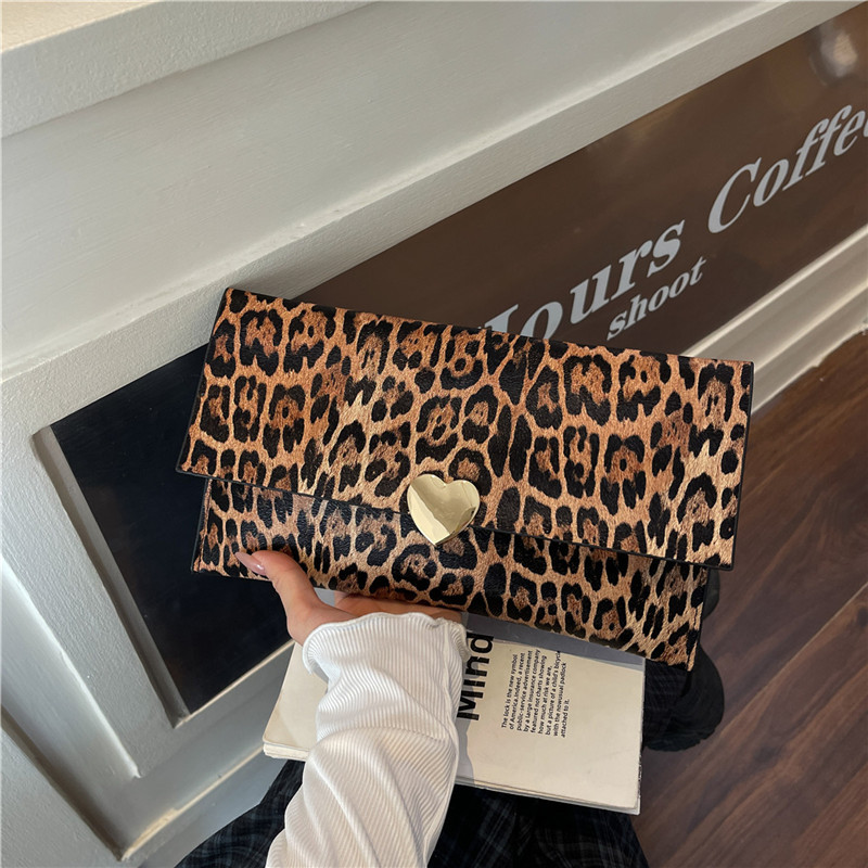 2025 nuevo estilo bolso de mano personalizado sobre femenino bolso de mano bolso de mano coreano a rayas moda temperamento bolso impreso estampado estampado estampado estampado leopardo