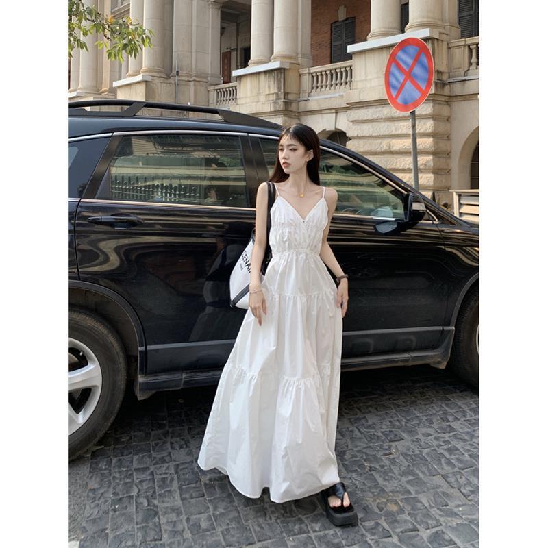 Summer New Seaside Vacation Style V-neck Sling Dress Women's Slimming White Long Dress French Style Beach Dress Summer New Seaside Vacation Style V-neck Sling Dress Women's Slimming White Long Dress French Style Beach Dress