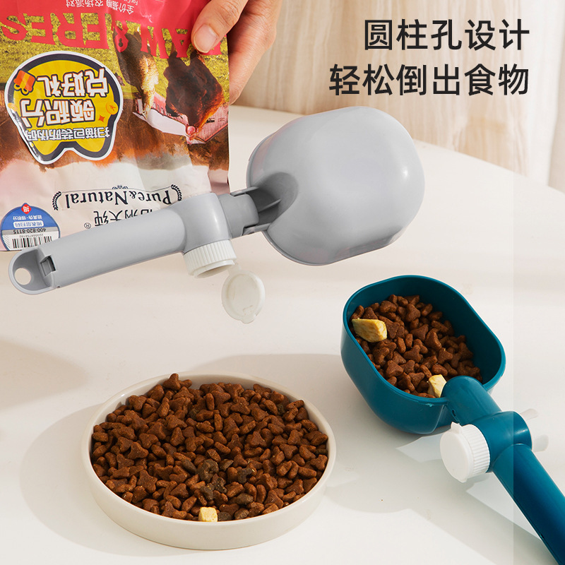 犬の食糧の猫の食糧のスプーンは計量して透明で、目盛りのスプーンがあります。犬に猫のスプーンをあげます。|undefined
