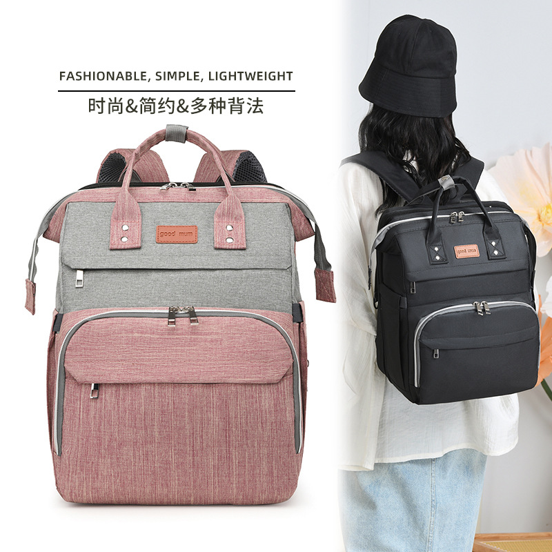 Nueva mochila de hombro de gran capacidad Baoma fuera de la bolsa de madre y bebé mochila de parto impermeable cama plegable bolsa de mamá