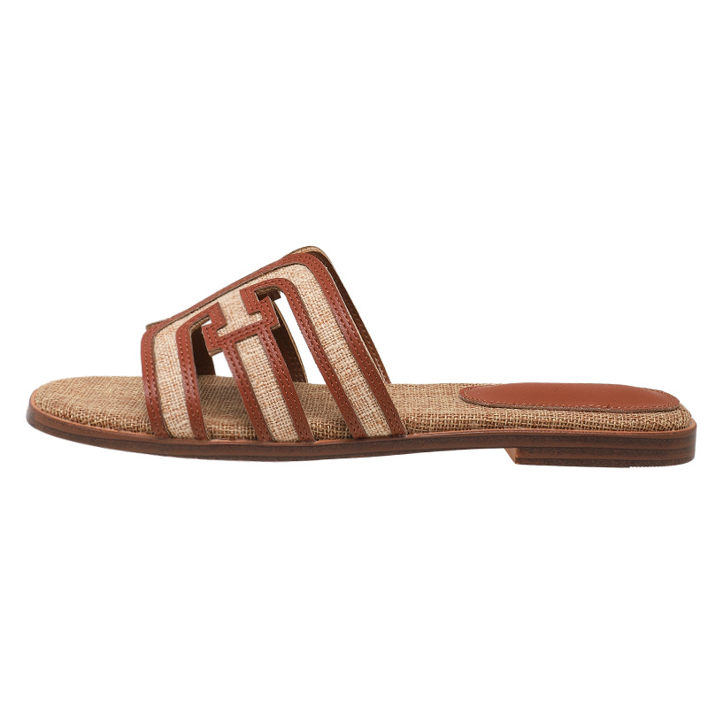 Inventario 2025 verano nuevo color retro tela de paja plana en una palabra H zapatillas para mujeres nuevo estilo de estilo de vacaciones