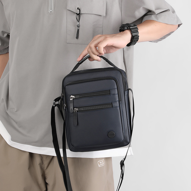 Hombres mochila al por mayor transfronteriza multifuncional nylon anti-derramamiento mochila multibolsillo mochila portátil