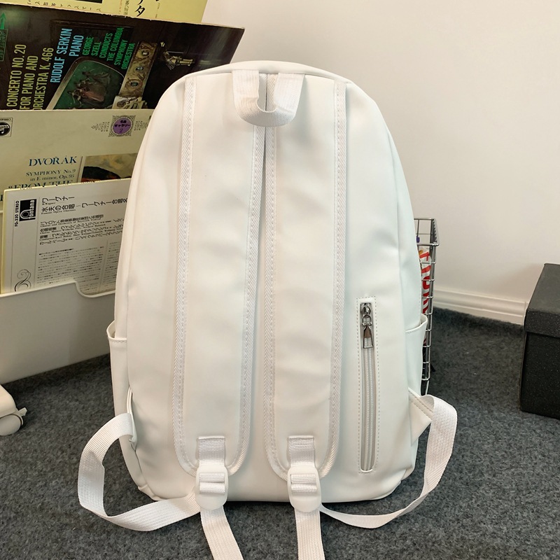 2023 nueva mochila de cuero suave de pareja de gran capacidad casual simple y versátil mochila escolar de computadora de viaje al aire libre al por mayor