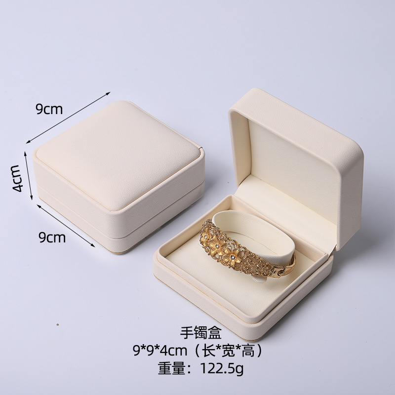 Caja de joyería rosa de alta calidad de cuero pu caja de embalaje de marca de joyería logotipo colgante pulsera collar caja de anillo
