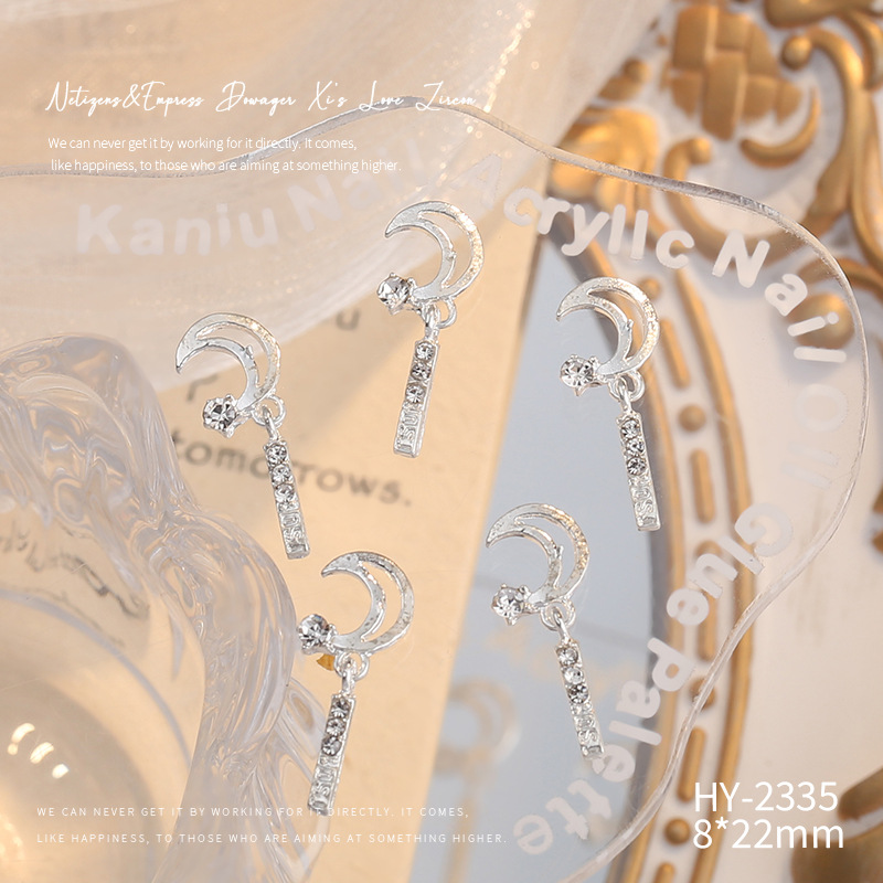 Nueva joyería de aleación de manicura completa diamante borla arco corona plata uñas manicura joyería accesorios al por mayor