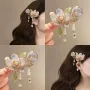 侧边墨蓝流苏荷花发夹