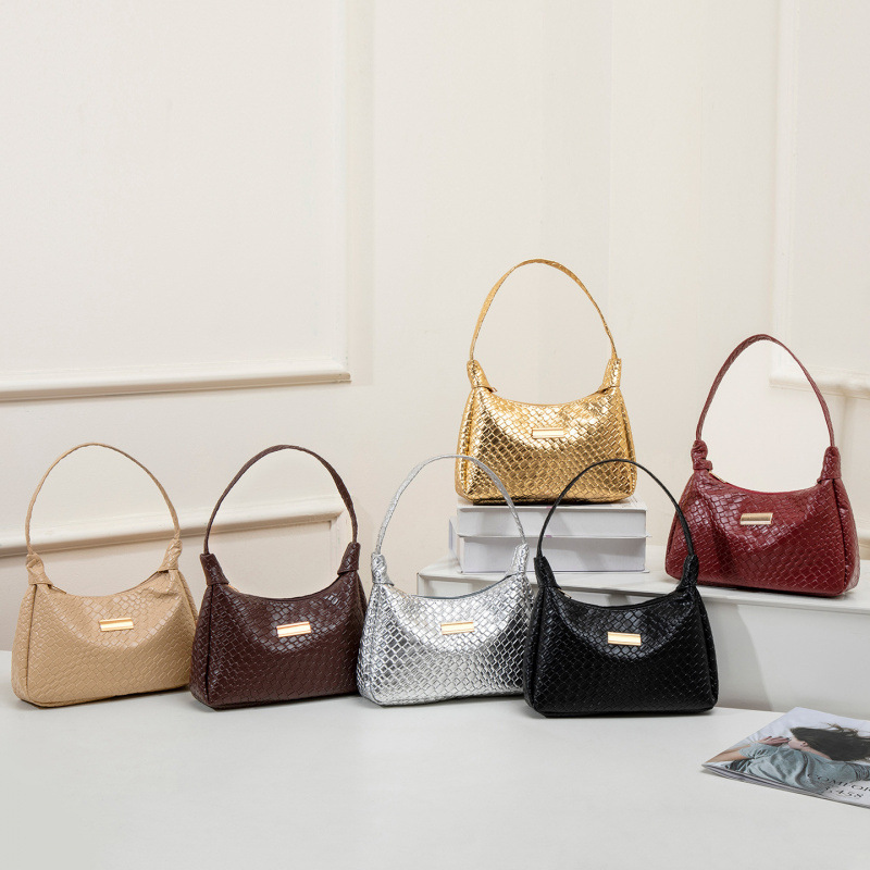 Bolsa debajo de las axilas otoño y invierno nueva bolsa de mujer de gran capacidad, moda de alta calidad, bolsa de hombro de viaje simple.