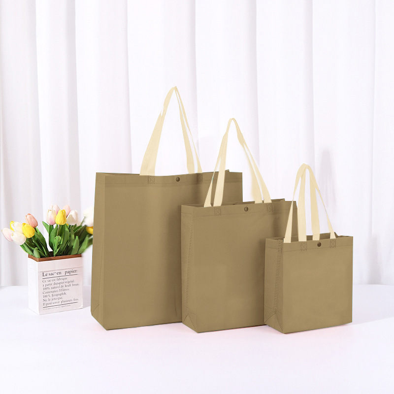 不織布バッグ、既製品、留め具付きハンドバッグ、カラーブロックショッピングバッグ、卸売、印刷入り衣料品包装袋、エコバッグ|undefined