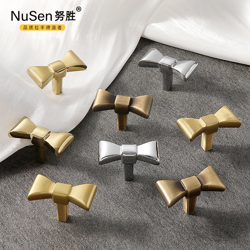法式輕奢創意蝴蝶結拉手亮金色鍍鉻仿古裝飾抽屜單孔衣櫃黃銅把手