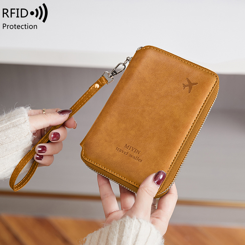 2024新款簡約護照夾多功能RFID防盜刷護照包大容量機票收納證件包