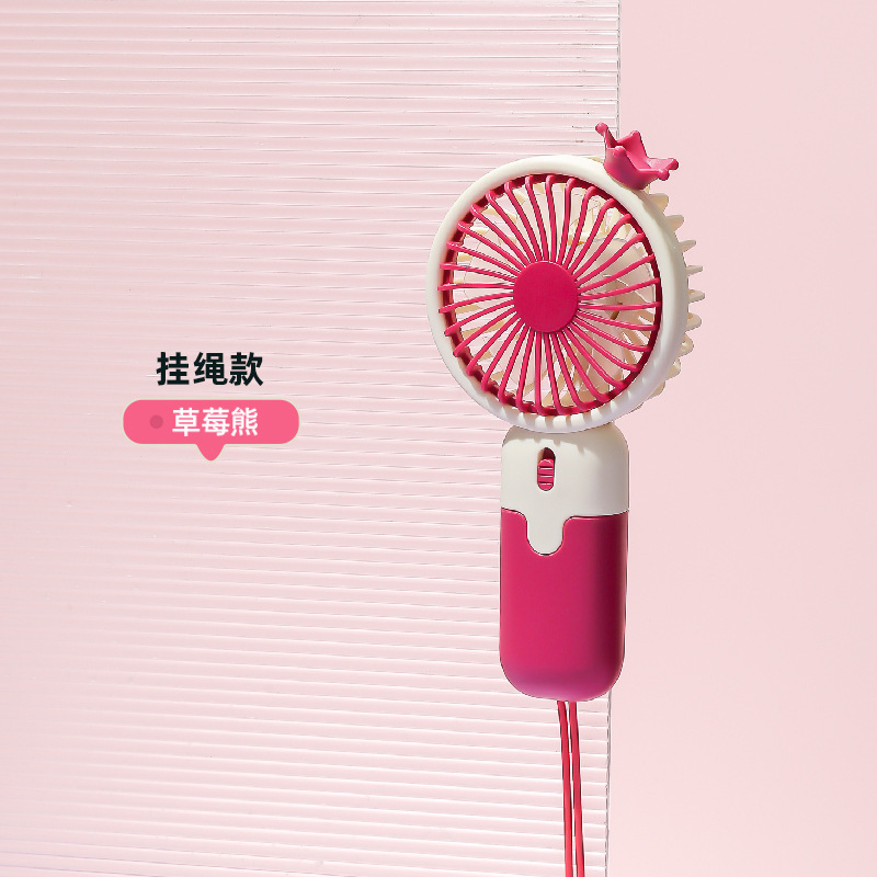 Venta al por mayor mudo gran viento plegable ventilador de mano niños portátil mini ventilador N ° 5 batería regalo LOGO
