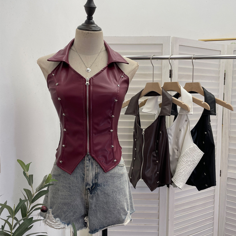 Real shot: Women's short vest with a turn-down collar, PU leather, halter neck, front zipper, and star rivets 2890