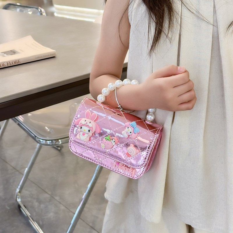 Bolso infantil 2024 nuevo estilo coreano de cadena de dibujos animados bolso de hombro estilo Xiaoxiang Ling mochila para hombres y mujeres bolsos pequeños