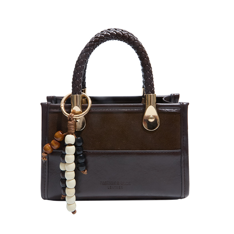 Niche Zhong Leopard Pattern retro bolso de mano mujer otoño / invierno 2025 nuevo estilo de alta calidad de viaje de hombro mochila