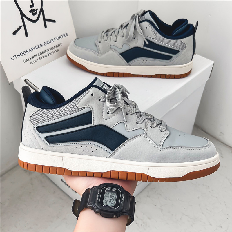Verano nueva moda casual Sneaker hombres zapatos de tablero de estudiante bajo Top estilo Hong Kong moda retro blanco zapatos