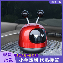 新型ロボット車載固体香薫置物自動車計器台香膏持続淡香薫卸売り