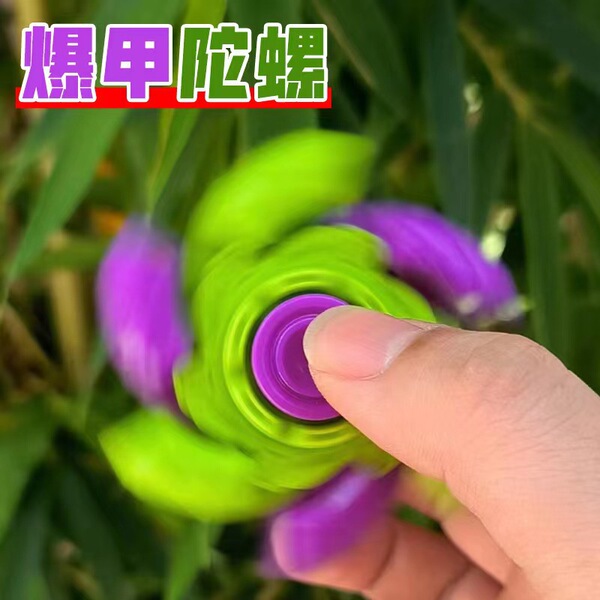 Fluorescence spinning top for finger