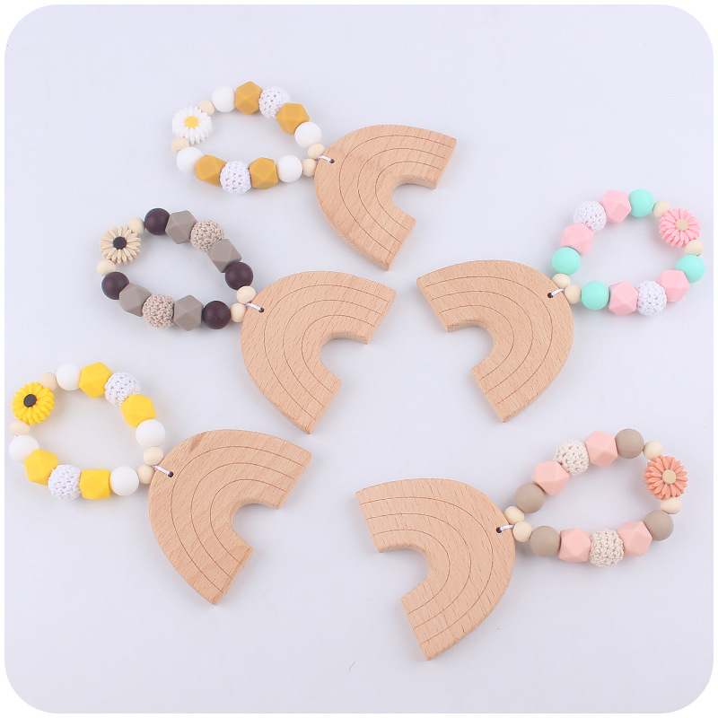Nuevo bebé suministros dibujos animados Arco Iris haya mordedor creativo DIY bebé mordedura teether pulsera juguete