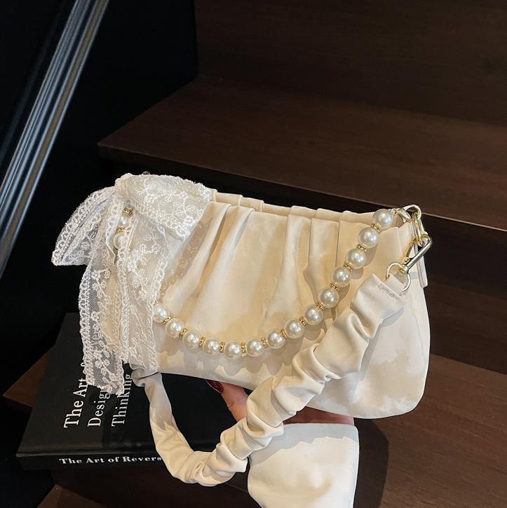 Bolso de axila de perlas plisadas para mujer 2025 nuevo bolso de hombro de alta gama de nicho francés bolso cuadrado pequeño de moda de todo fósforo