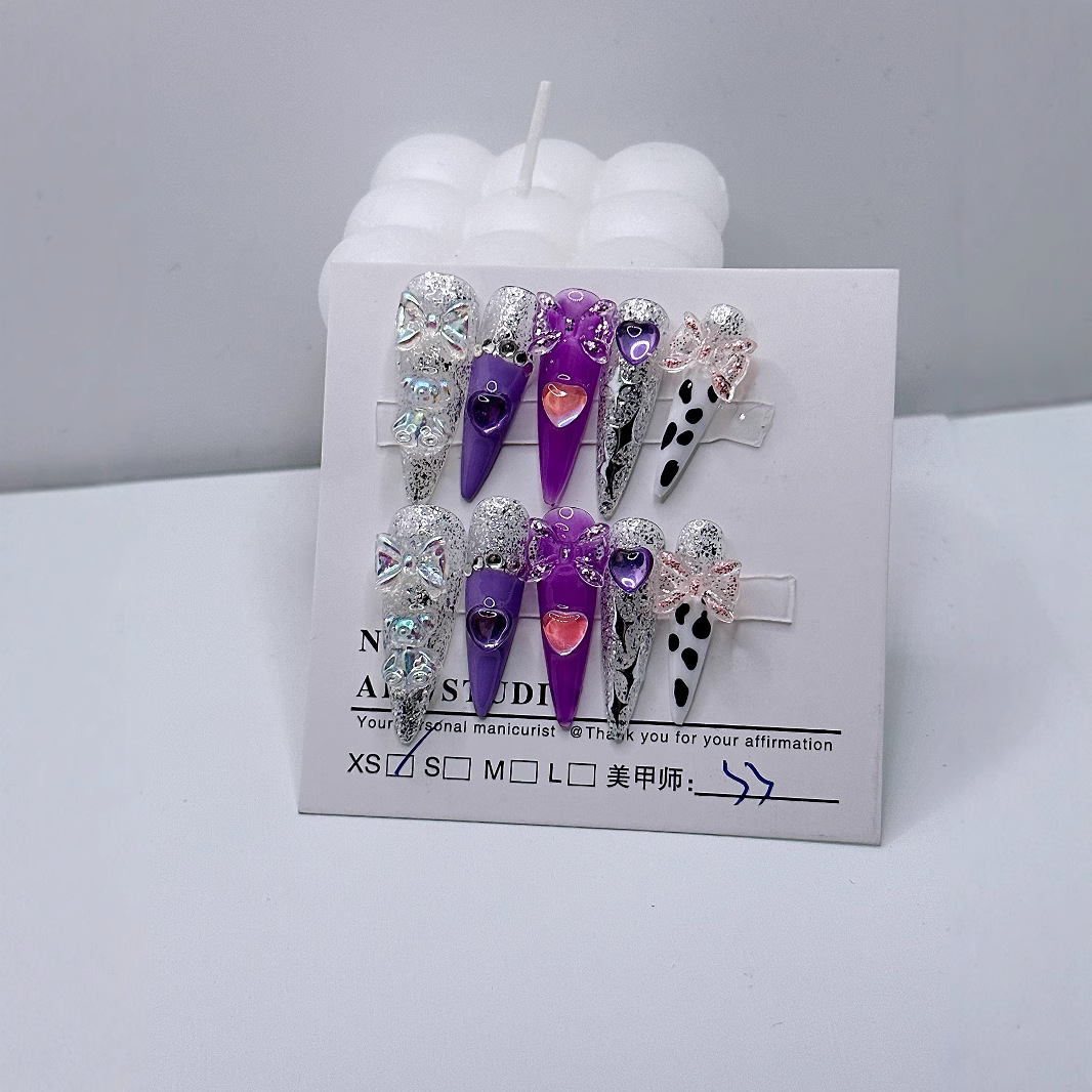 Hecho a mano desgaste de uñas de hielo transparente hidratante Purple Girl corazón japonés dulce uñas parche producto terminado al por mayor