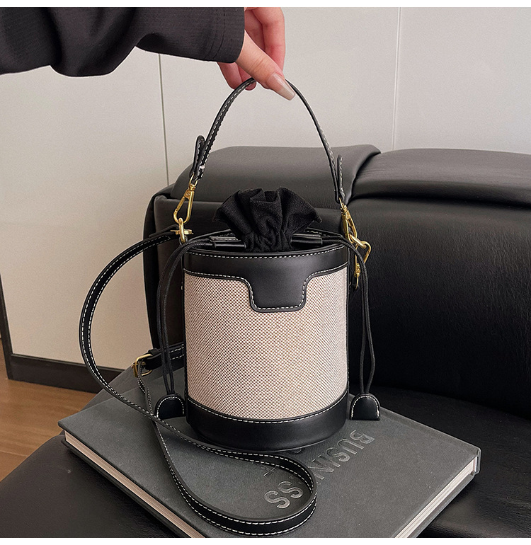 Bolso de mano cilíndrico de color contrastante para mujer, novedad 2026, estilo transfronterizo del Sudeste Asiático, a la moda, bandolera de un solo hombro