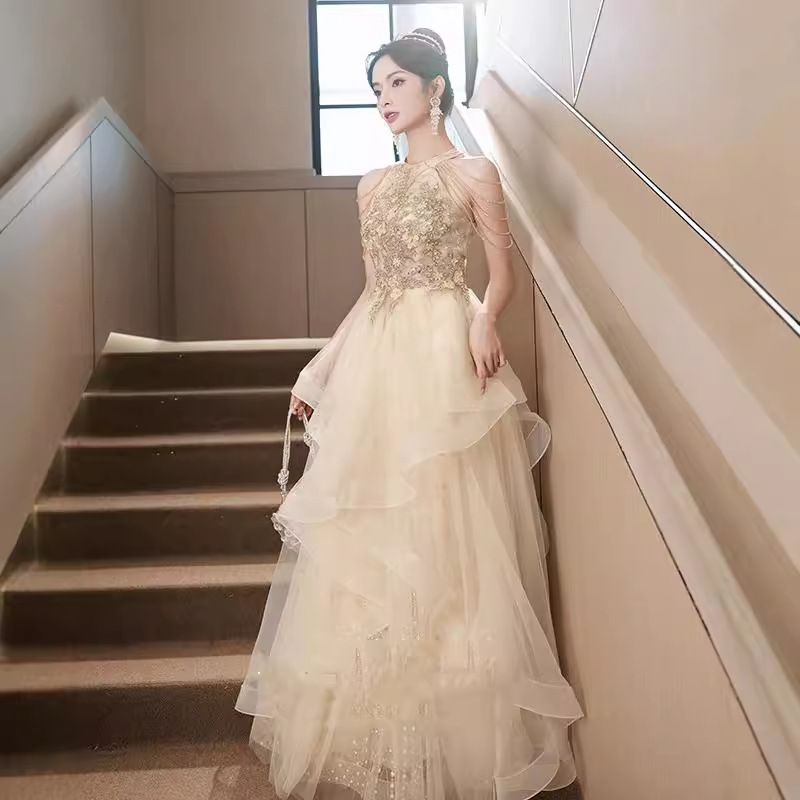 Vestido de noche de champagne temperamento de banquete de otoño anfitrión de alto nivel lujo nicho de gama alta vestido de examen de arte para adultos