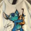 White Stitch playing guitar