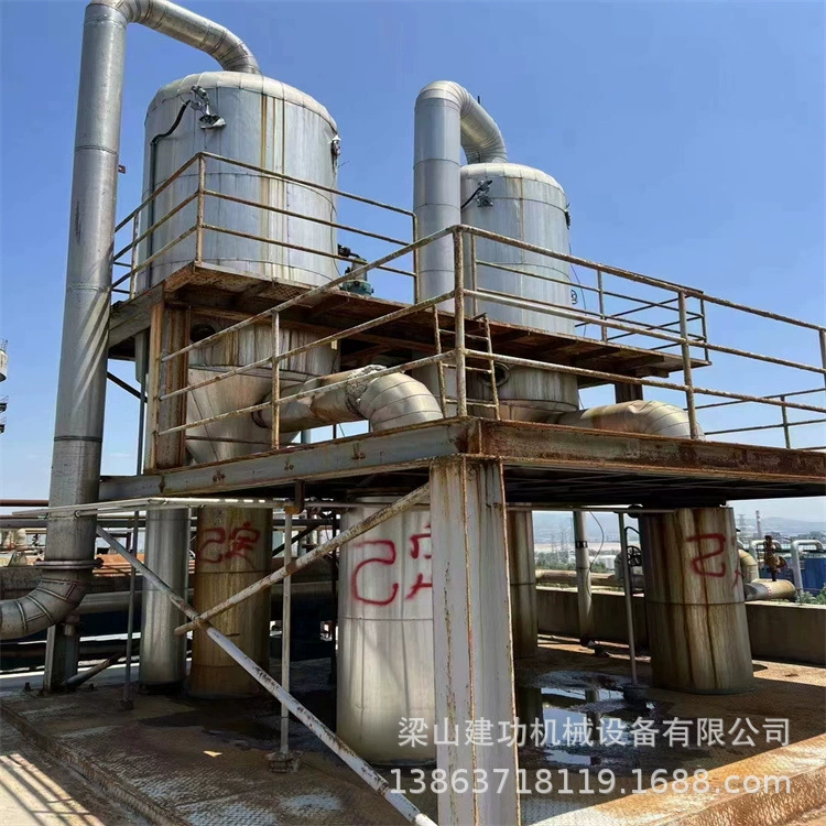 Б/у 4-тонный измельченный циркуляционный титановый испаритель с двойным эффектом, вакуумное низкотемпературное непрерывное испарение, концентрированное кристаллическое оборудование