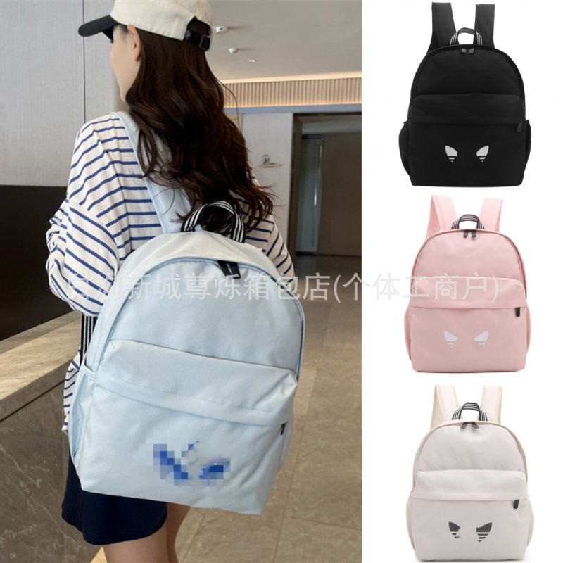 Large-capacity backpack for elementary, middle, and high school students, suitable for commuting and sports, unisex, simple and lightweight, with compartments for storing a laptop