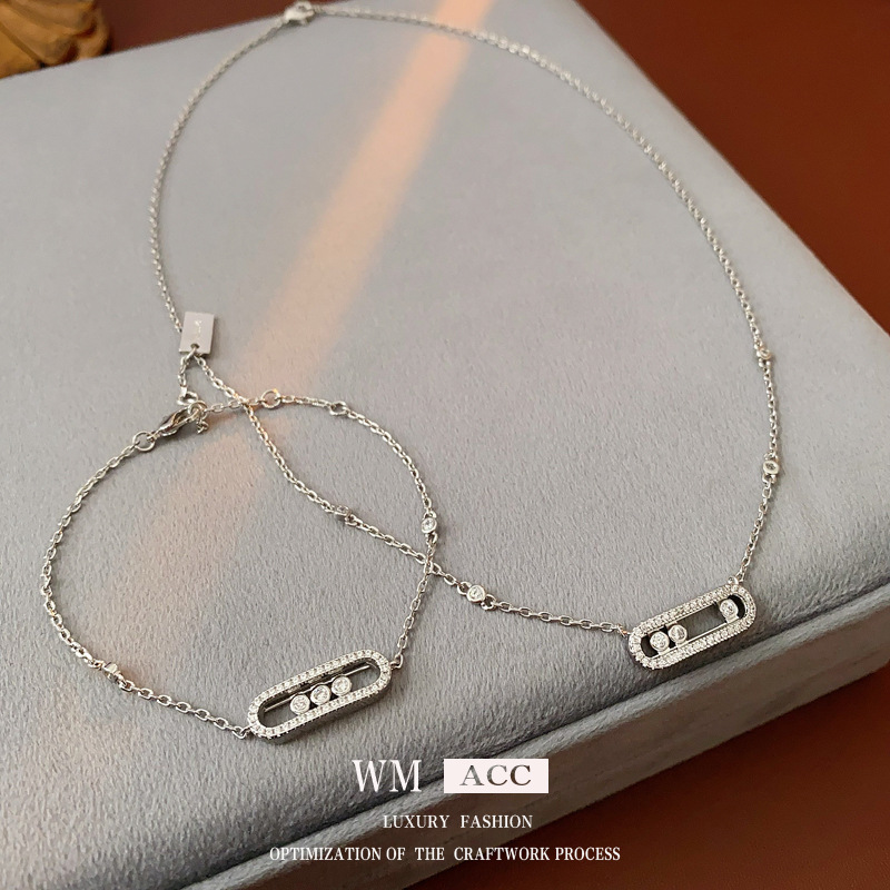 Zircon hueco deslizante collar elíptico ligero lujo frío viento delicado pulsera alta sensación de moda conjunto de joyería mujer