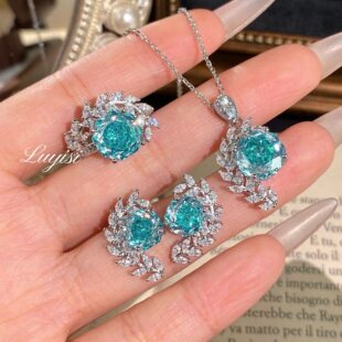 New octagonal Millennium Rose cut Paraiba pendant necklace set with high carbon diamond leaves surrounding ring set