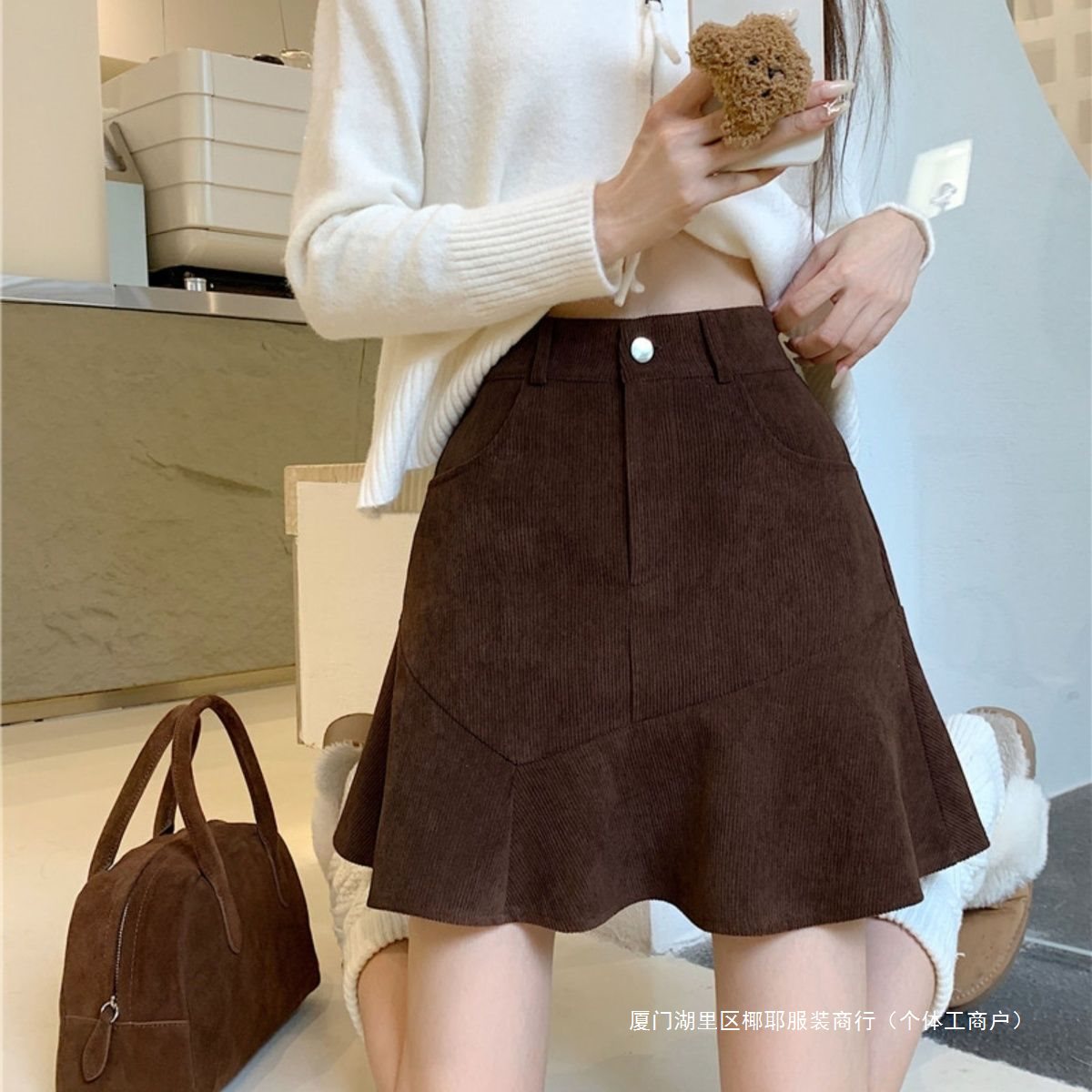 秋冬新款高腰2025灯芯绒半身裙不规则设计显瘦荷叶鱼尾短裙